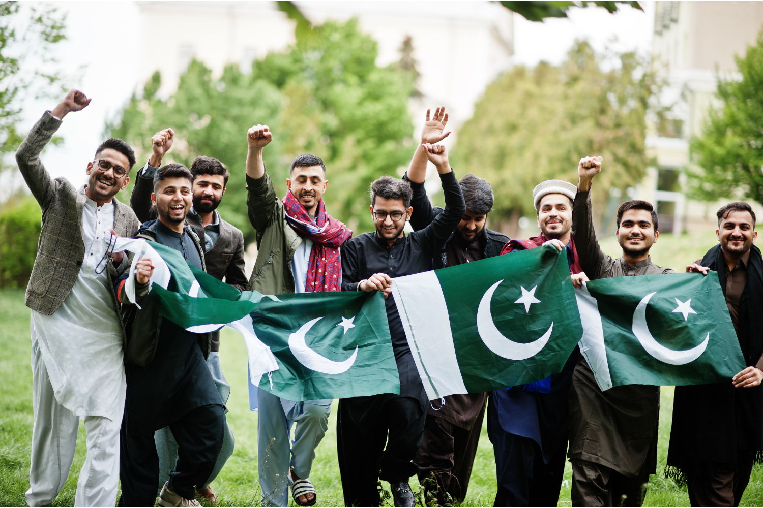 Pakistani cricket fans holding the national flag, embodying the spirit and passion of the T20 World Cup.